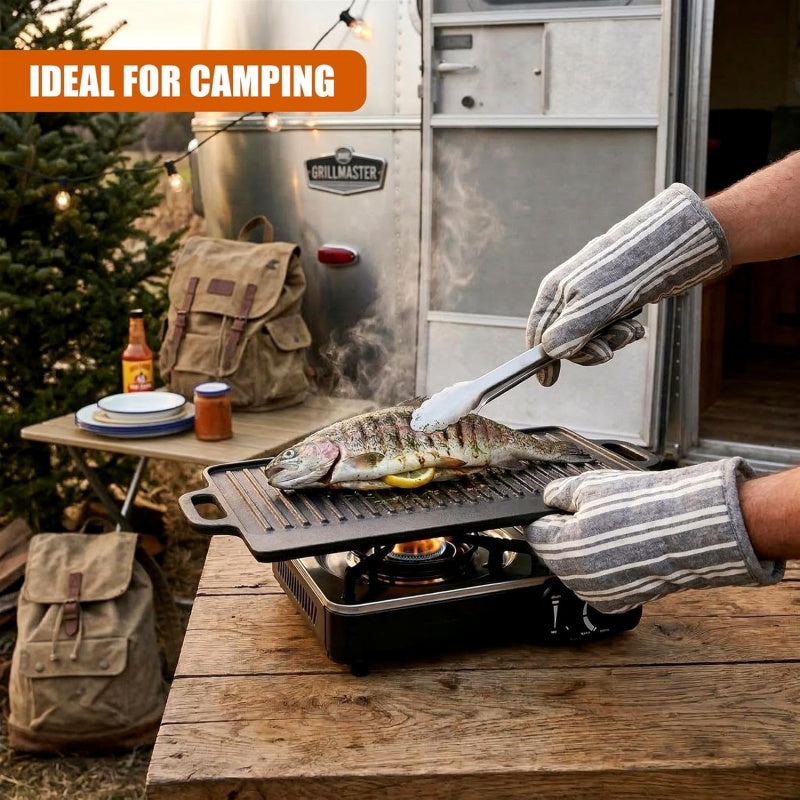 Cast iron HOMCOM reversible BBQ skillet with double-sided griddle plate for grilling and frying.