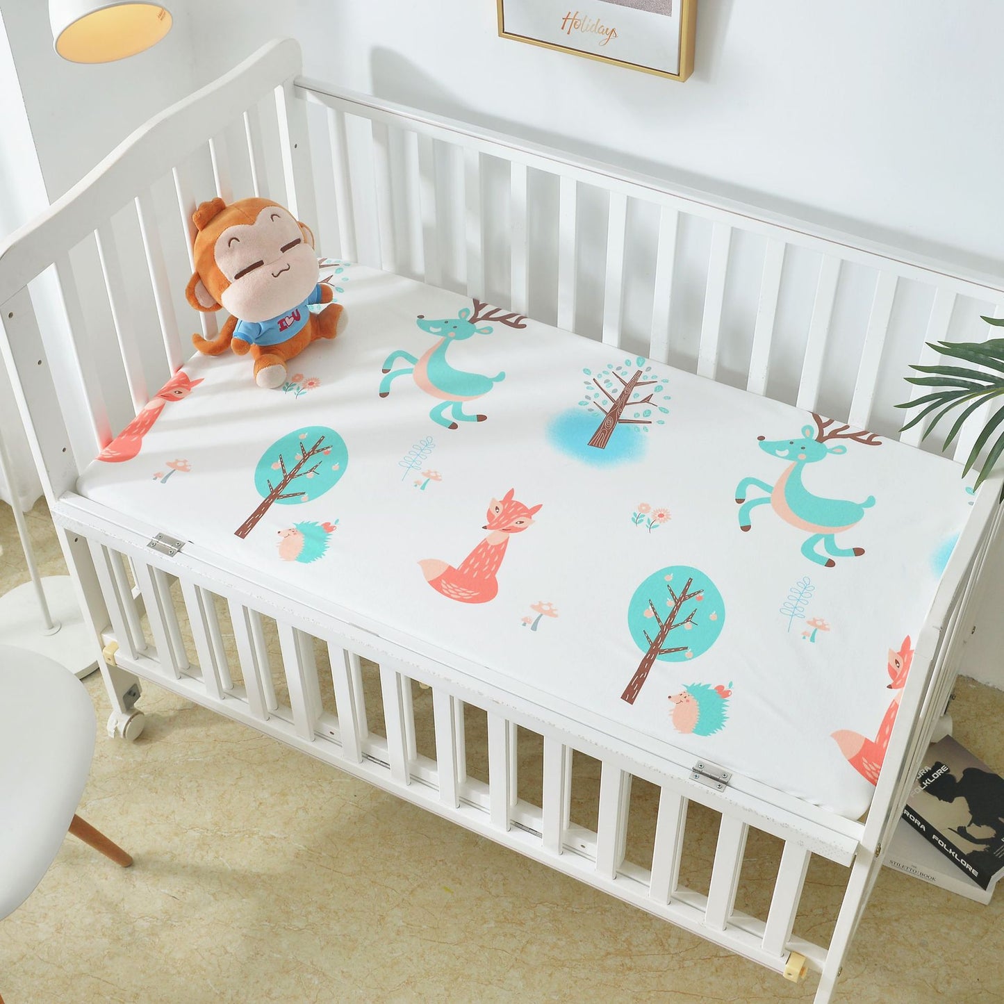 HOMCOM waterproof cotton crib bed sheet with breathable, urine-proof fabric and non-slip design for secure, comfortable sleep.