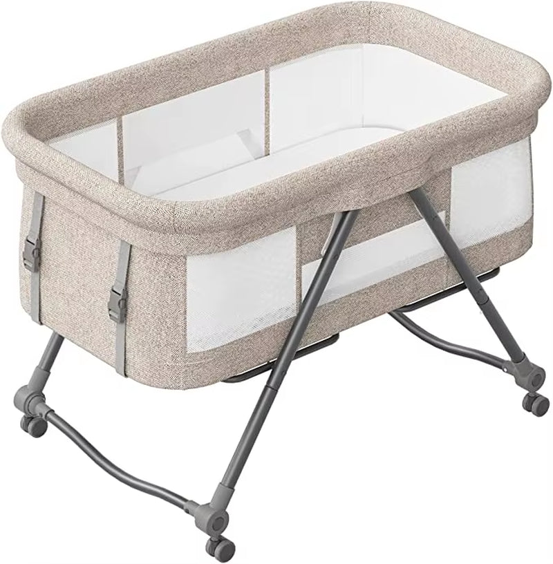Livoshop Baby Travel Cot with mattress and silent wheels, convertible rocking crib for on-the-go comfort and convenience