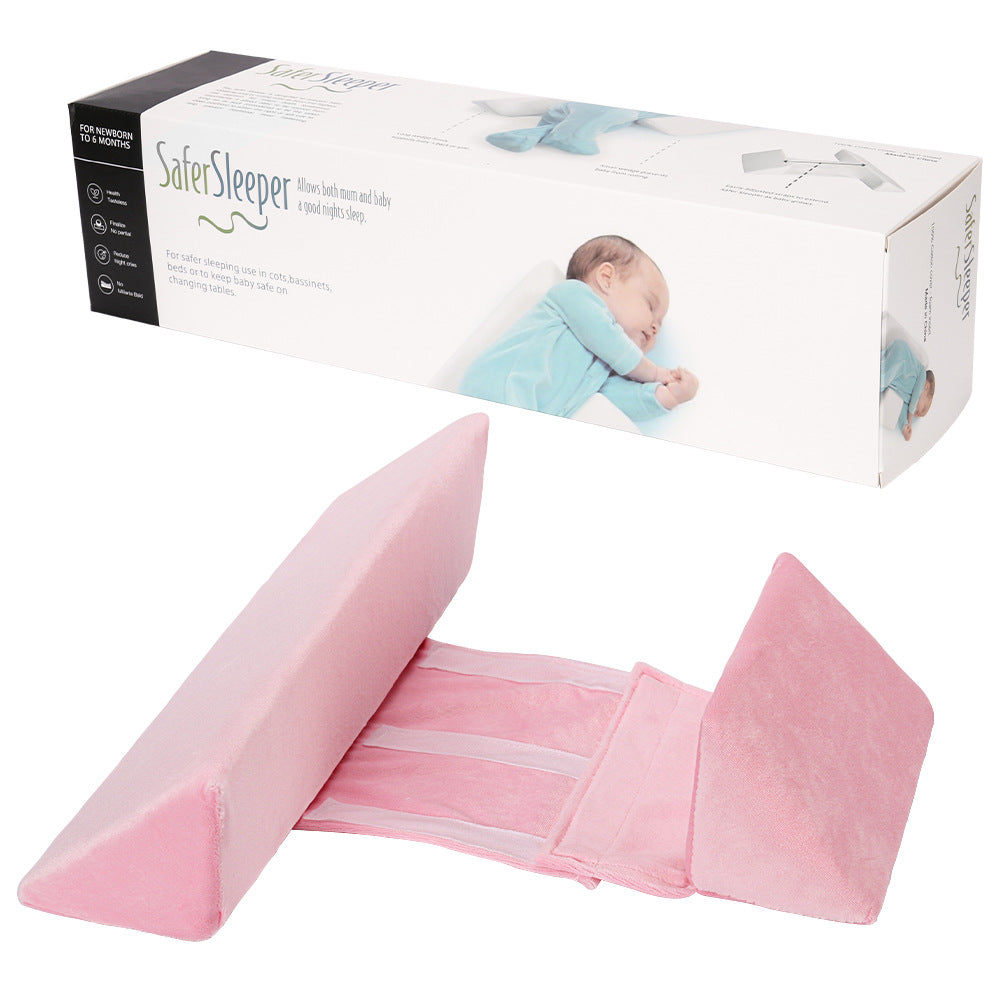 Baby side sleeping pillow by eprolo with contoured support to prevent head deviation, featuring soft fabric and ergonomic design.