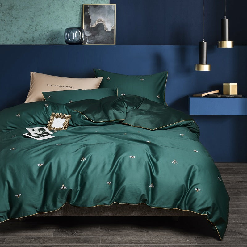 American style four-piece cotton bed by HOMCOM, featuring a modern design with soft white bedding and matching pillows.