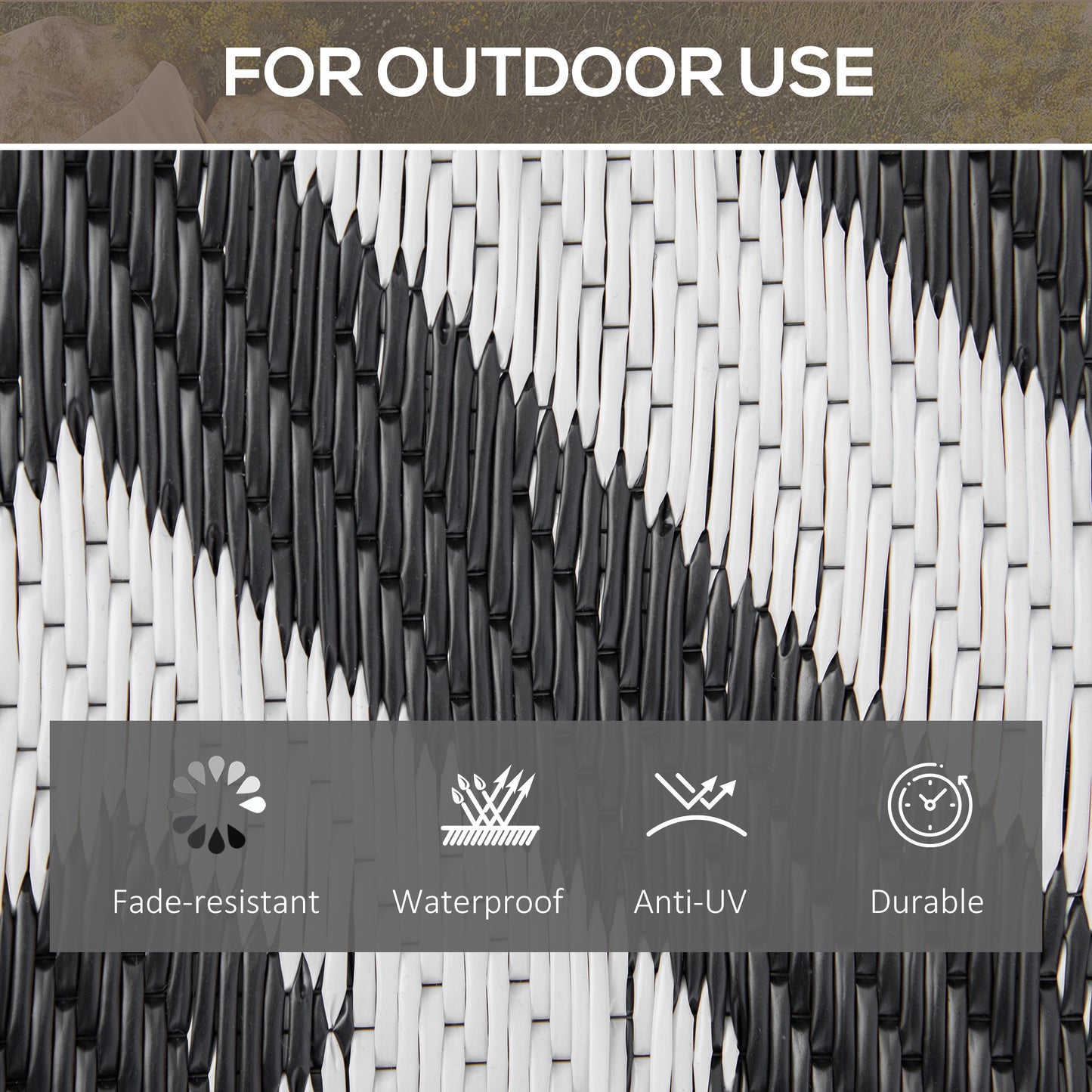 Reversible outdoor rug in black, 152x243cm, portable plastic straw camping and garden mat for outdoor use.