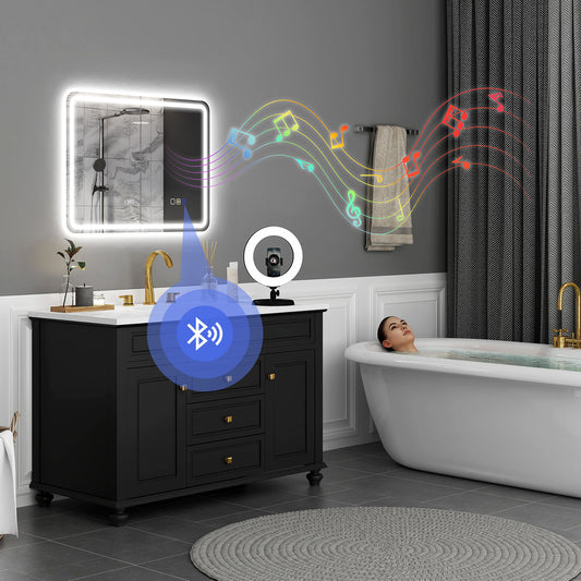 Silver-tone Bluetooth bathroom mirror, 80x60 cm with integrated wireless speaker and modern design by HOMCOM.