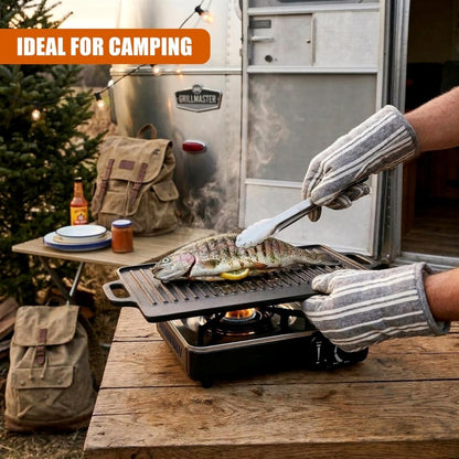 Cast iron HOMCOM reversible BBQ skillet with double-sided griddle plate for grilling and frying.