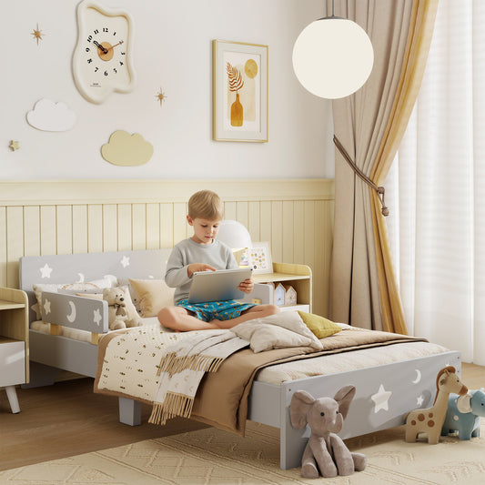 Grey HOMCOM ZONEKIZ kids toddler bed with star and moon patterns, side rails, designed for children aged 3 to 6 years.