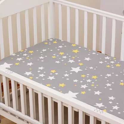 HOMCOM cotton baby bed sheet with colorful cartoon design, soft bedding for infants and young children, suitable for baby cribs.