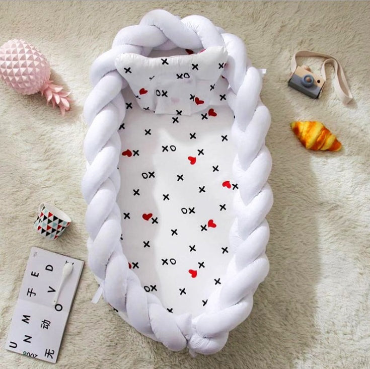 Portable cotton crib by HOMCOM with soft white fabric and sturdy frame, designed for convenient baby sleeping and resting.