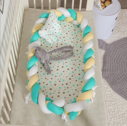 HOMCOM portable cotton crib with soft fabric sides and sturdy frame, ideal for easy travel and comfortable rest for infants.