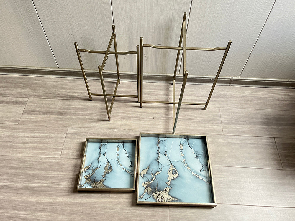 Set of two square tables by MSL in 53x45cm size, featuring sleek, modern design with smooth tabletops and sturdy legs.