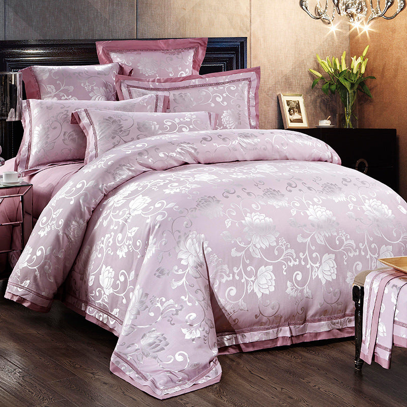 HOMCOM four-piece home textiles and bedding set with coordinated sheets, pillowcases, and duvet covers in neutral tones.
