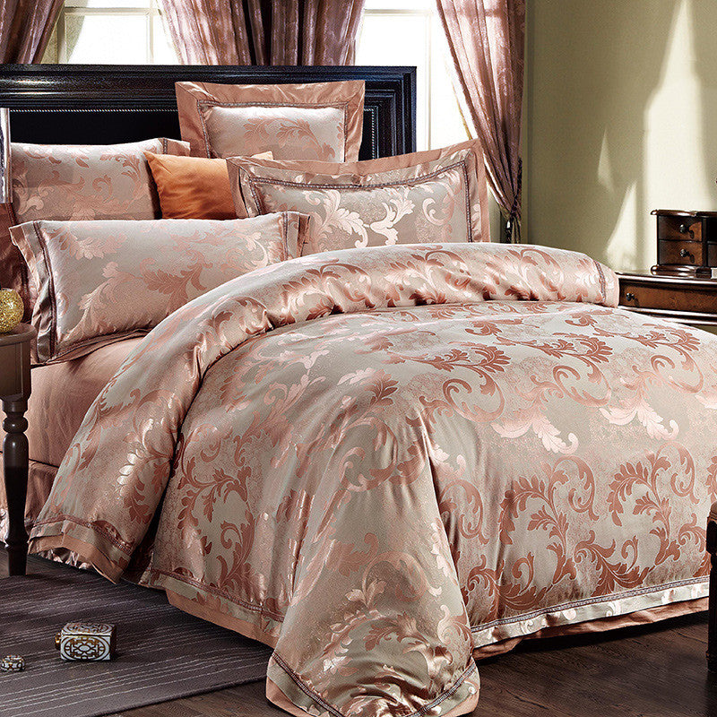 HOMCOM four-piece home textiles and bedding set with coordinated bed linens, pillowcases, and decorative throws arranged on a bed.