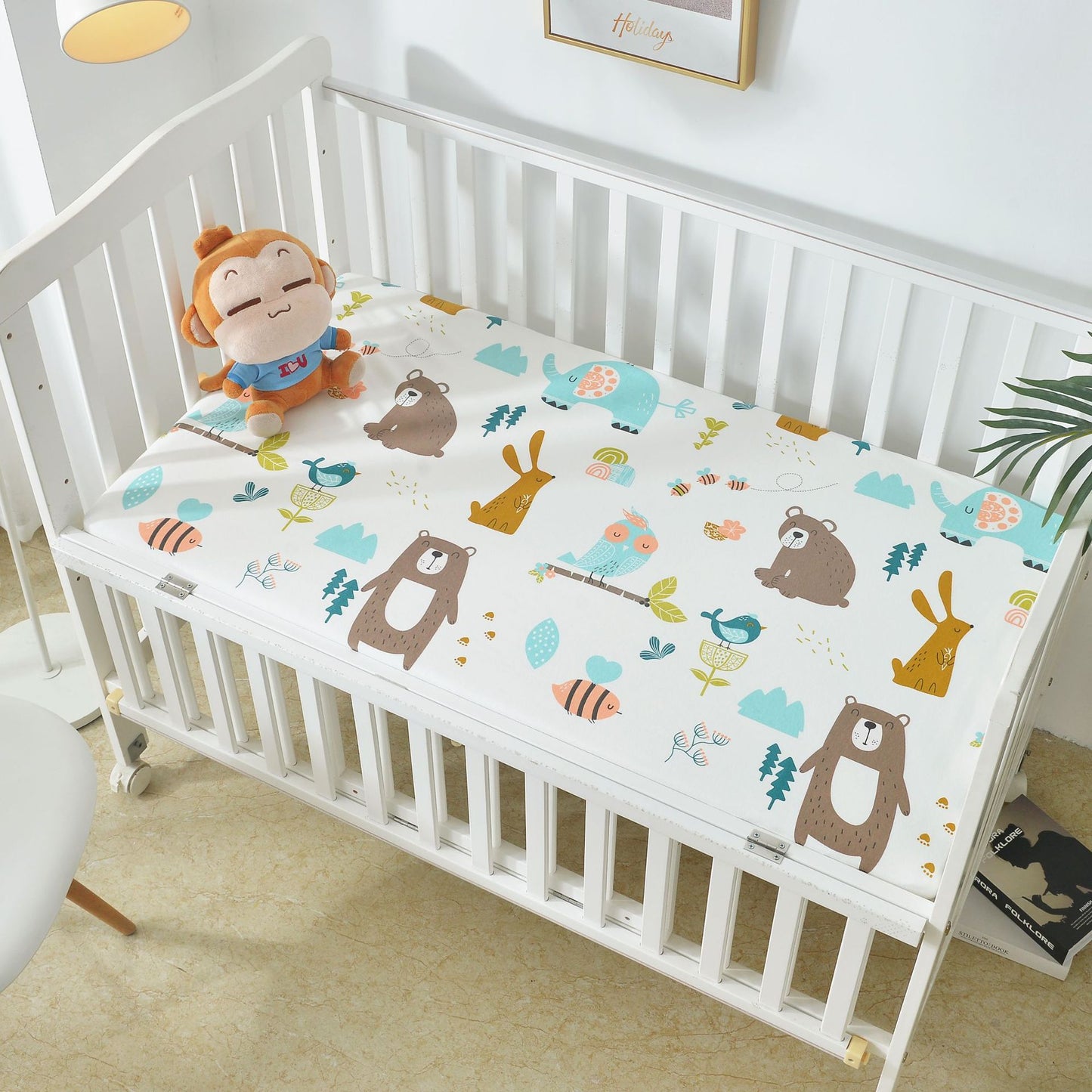 HOMCOM cotton crib bed sheet with waterproof, breathable, urine-proof fabric and non-slip design for secure, comfortable baby bedding.