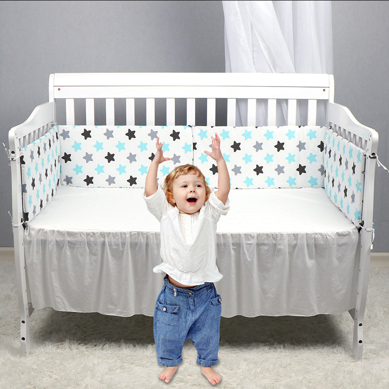 HOMCOM baby bed bumper cushion surrounds a crib, providing soft, thick padding for safety and comfort in a nursery setting.