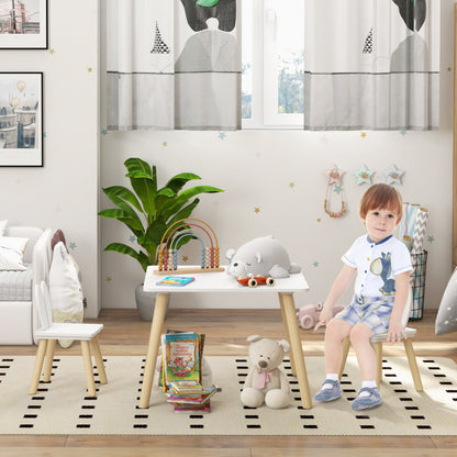 HOMCOM 3-piece toddler table and chair set with bunny ear backrests, perfect for nursery or playroom activities.