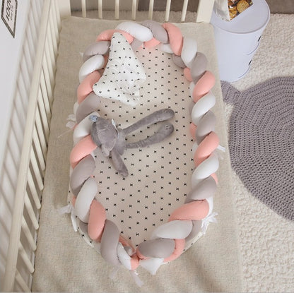 HOMCOM portable cotton crib with soft fabric sides and sturdy frame, ideal for easy mobility and comfortable sleep for infants.
