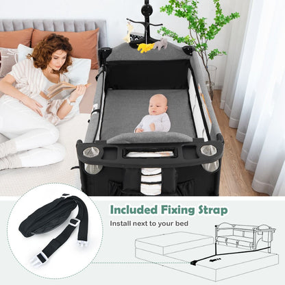 Livoshop 5-in-1 baby bassinet and bedside sleeper with diaper changer and hanging toys, designed for convenient infant care.