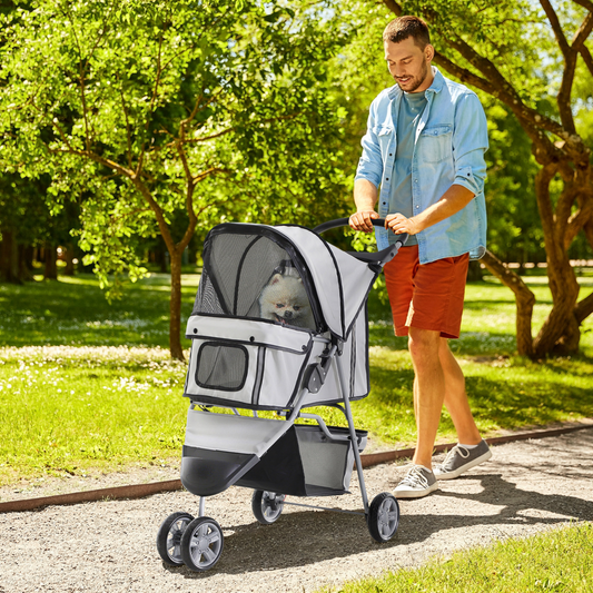 Grey PawHut 3-wheel pet stroller with canopy, designed for cats and puppies, featuring a comfortable carrier and easy maneuverability.