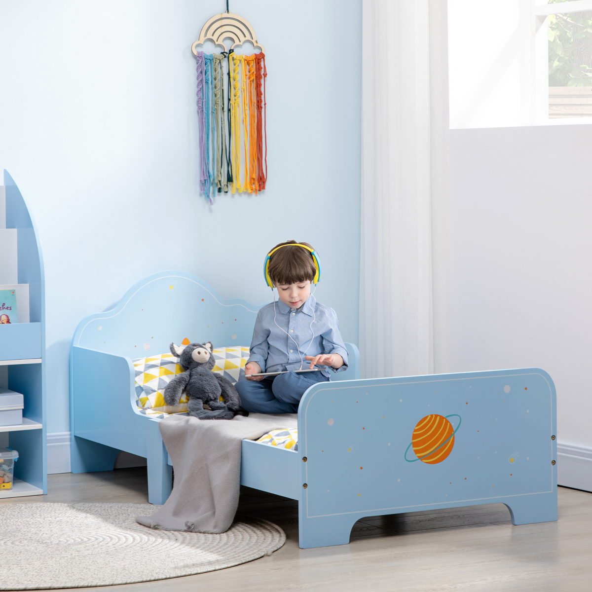 ZoneKIZ toddler bed with space-themed patterns, suitable for boys and girls aged 3-6 years, featuring colorful celestial designs.