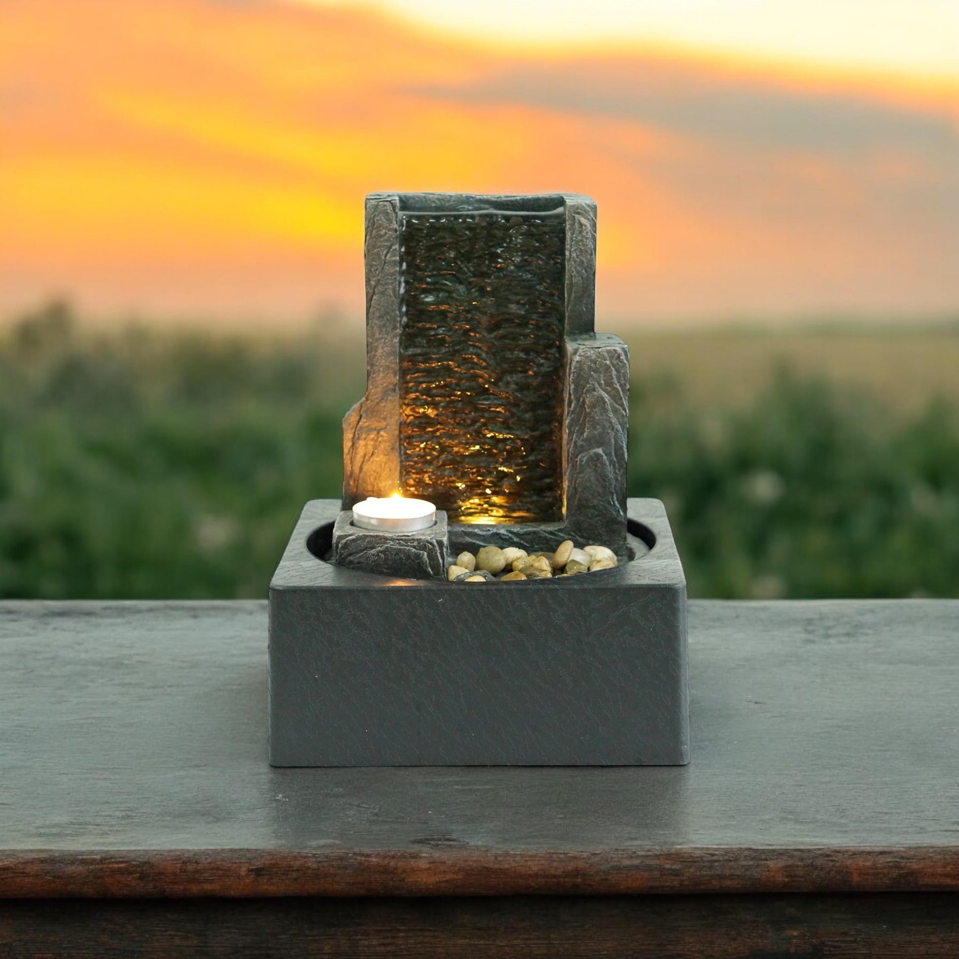 MSL 24cm decorative fountain with flowing water and stone finish, perfect for garden or outdoor display.