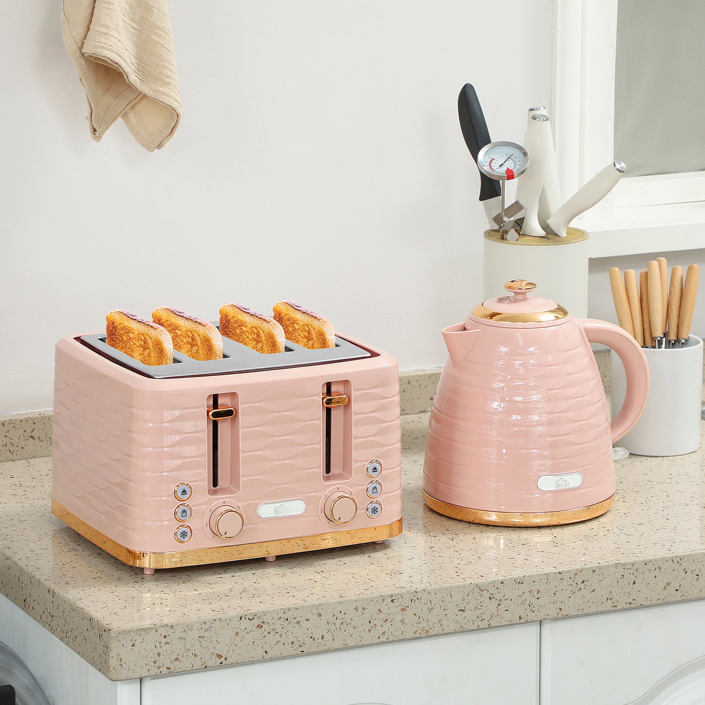 HOMCOM 3000W 1.7L pink kettle and 4-slice toaster set with browning controls and crumb tray, stylish kitchen appliances.