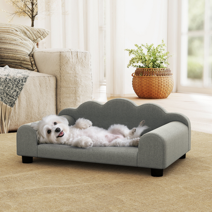 Soft gray dog bed or pet sofa with cushioned sides, designed for comfort and support for small to medium dogs.