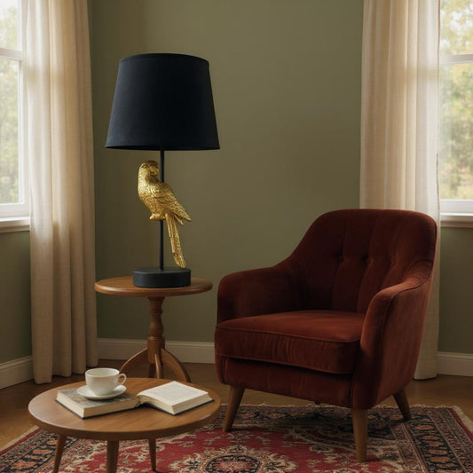 Gold bird table lamp with black shade by MSL, modern decorative bedside light featuring a stylish bird design and sleek finish.