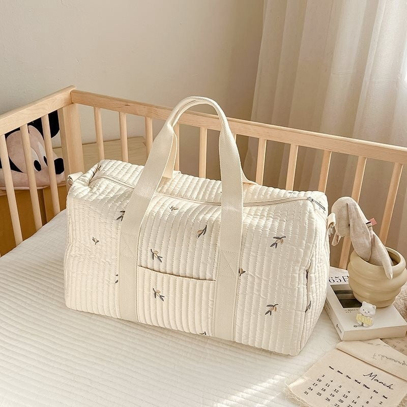 Large embroidered travel bag by eprolo with spacious interior, sturdy handles, and stylish design for travel and everyday use.
