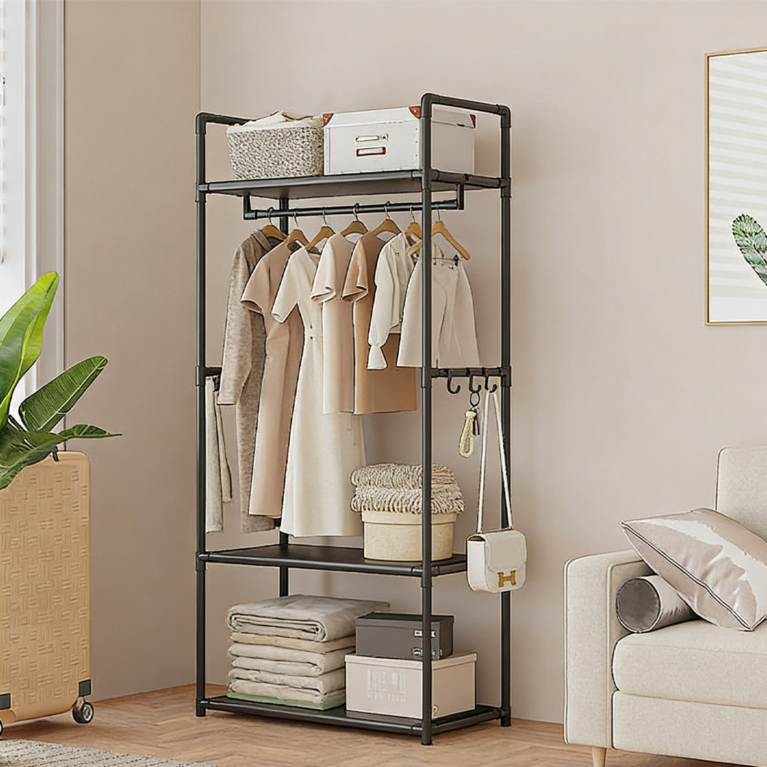 Black HOMCOM multifunctional clothes rail and shoe rack with storage shelf, sturdy garment hanging stand without wheels.
