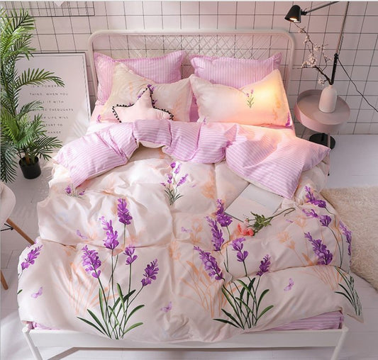 HOMCOM 4-piece bedding set with patterned duvet cover, pillowcases, and sheets displayed on a neatly made bed.
