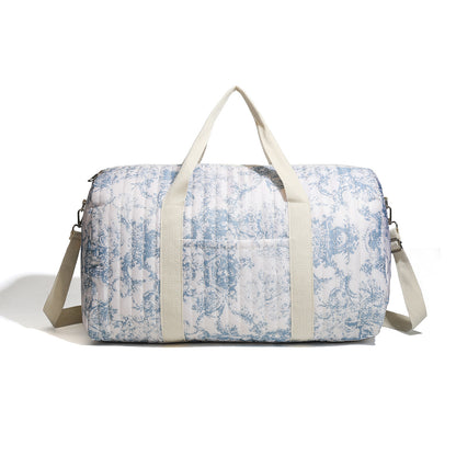 Large embroidered travel bag by eprolo featuring sturdy handles, spacious interior, and detailed embroidery design.