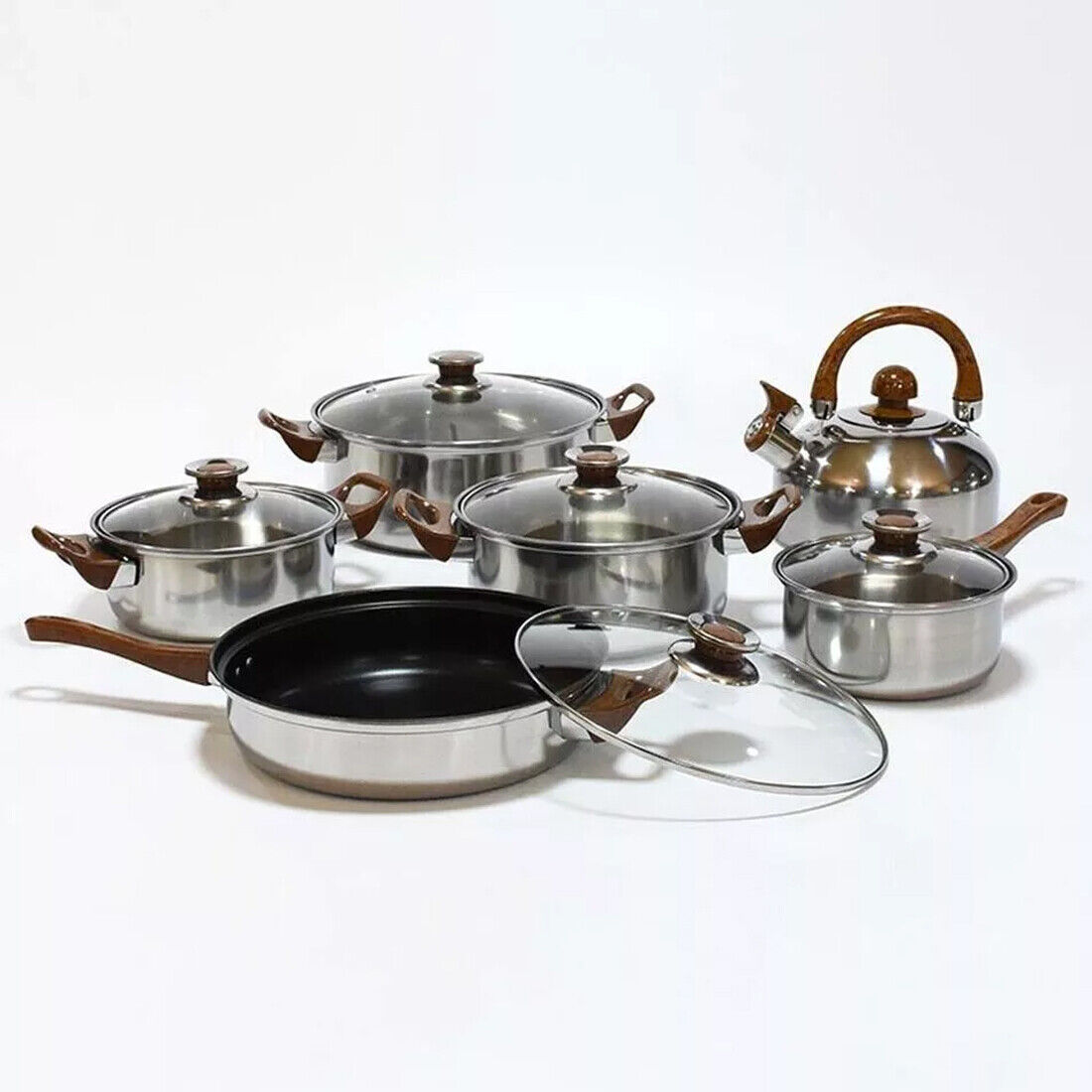 HOMCOM 12-piece stainless steel cookware set with saucepans, casseroles, fry pans, and glass lids on a white background.