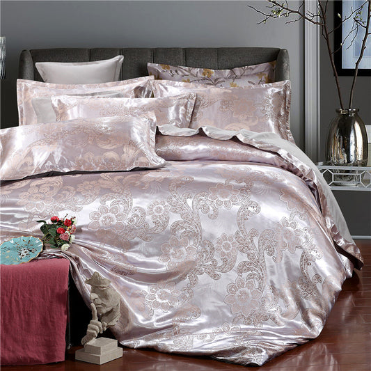 Four-piece HOMCOM jacquard bedding set with intricate woven patterns on a neatly made bed.