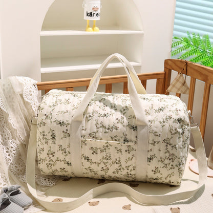 Large embroidered travel bag by eprolo featuring spacious design, sturdy handles, and intricate embroidery details.