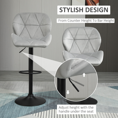 Set of 2 light grey fabric bar stools with adjustable height and metal bases, ideal for kitchen counters or bars.