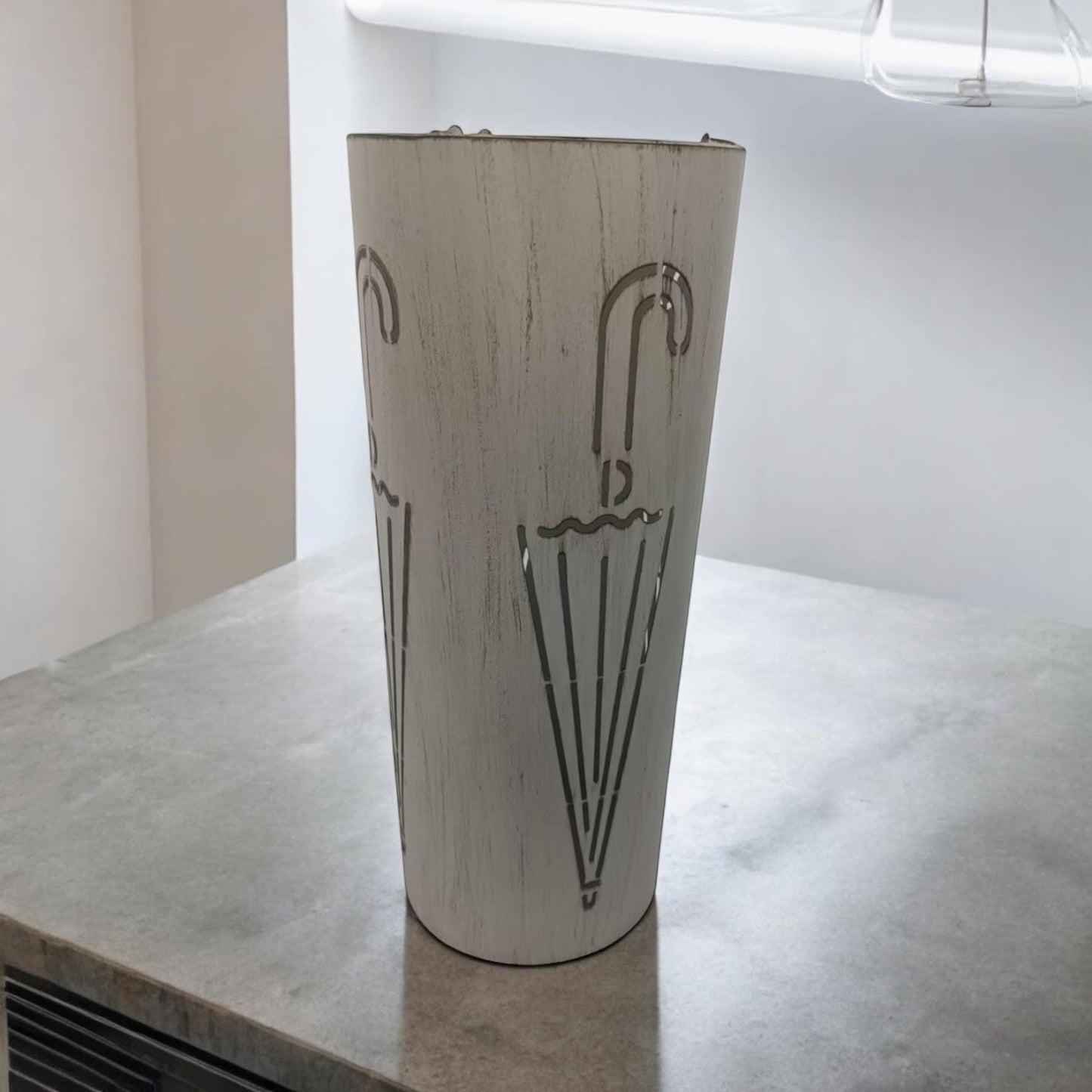 Cream metal umbrella stand, 49cm tall, with a sleek design from MSL, designed to hold umbrellas in an elegant entryway.