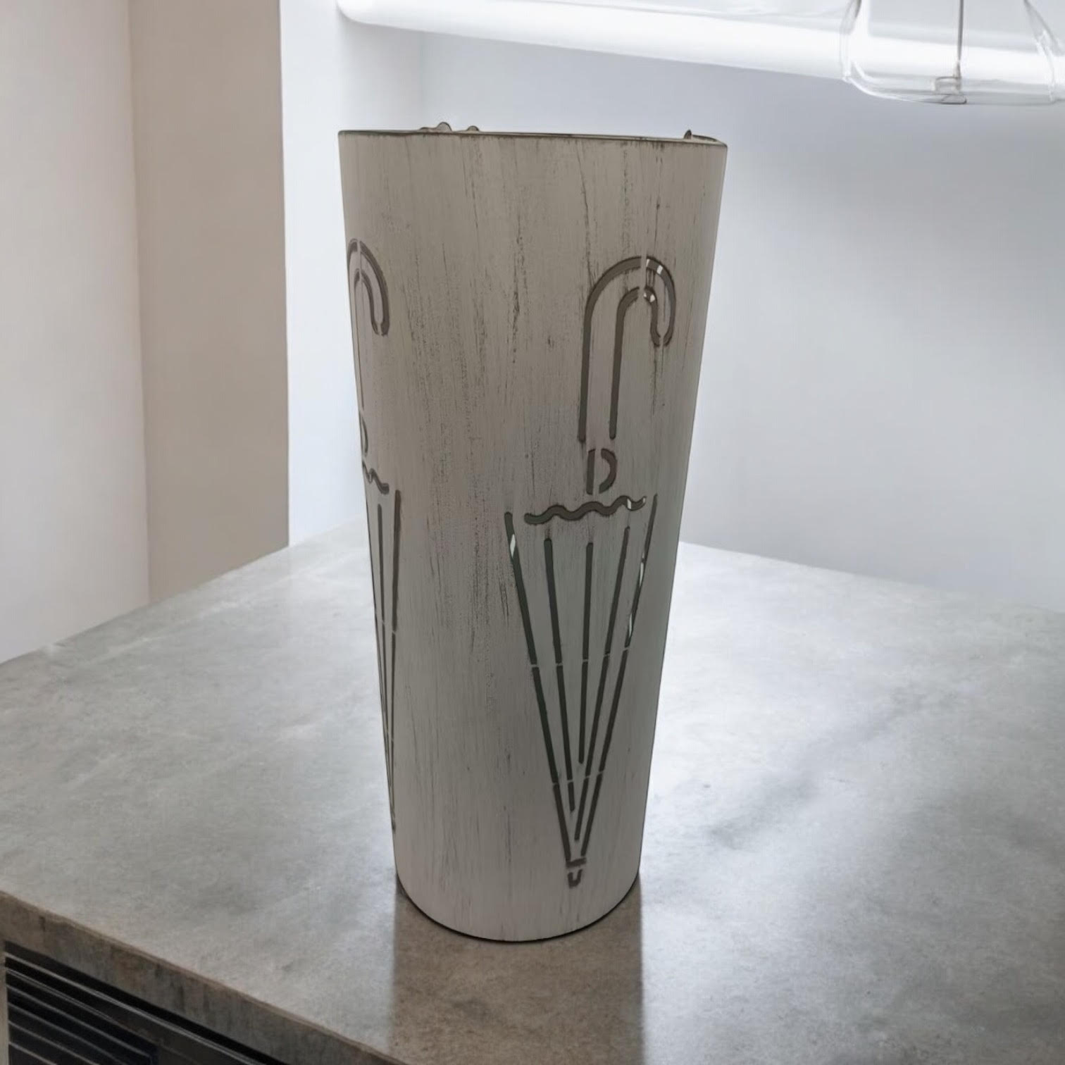 Cream metal umbrella stand, 49cm tall, with a sleek design from MSL, designed to hold umbrellas in an elegant entryway.