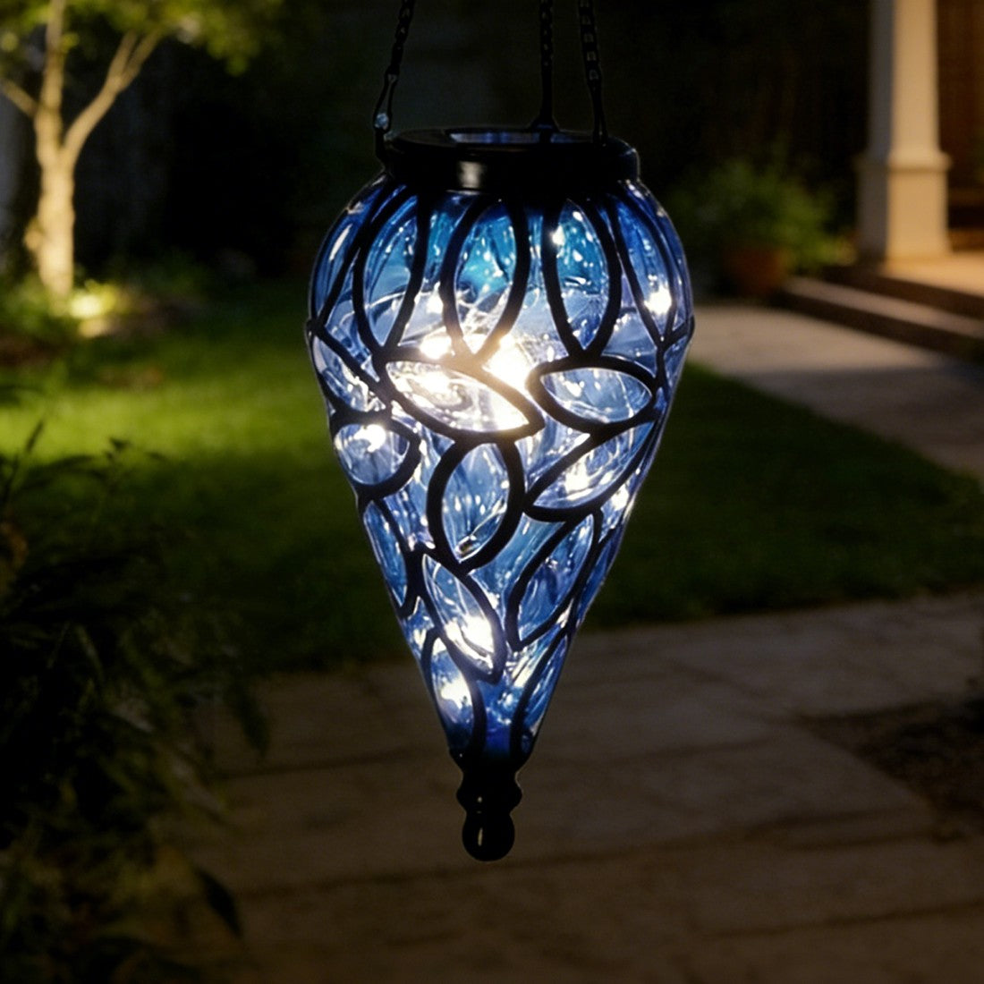 HOMCOM outdoor solar-powered LED lantern hanging yard decoration lamp with illuminated design and metal handle.