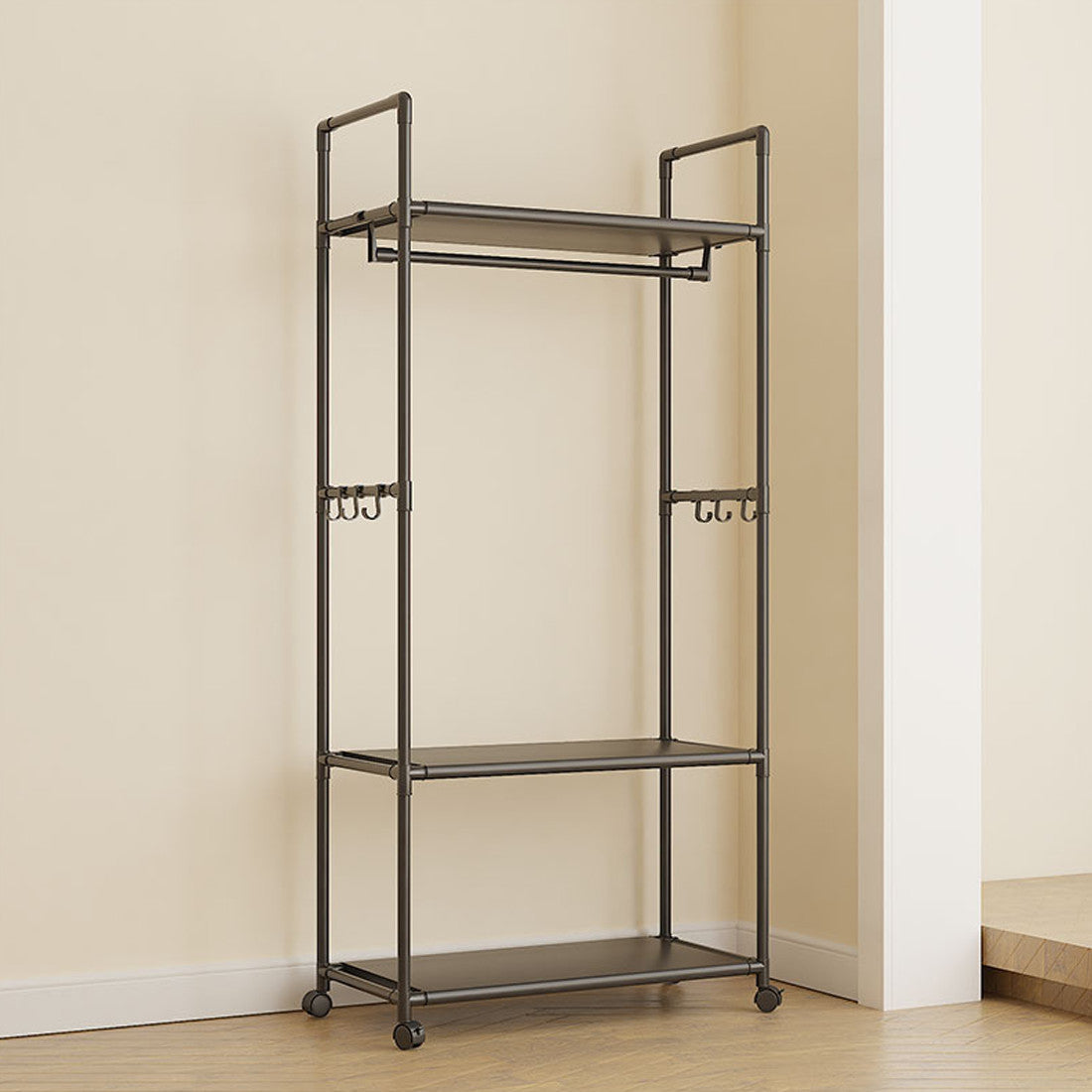 HOMCOM black multifunctional clothes rail and shoe rack with garment hanging stand and storage shelf, without wheels, for home organization.