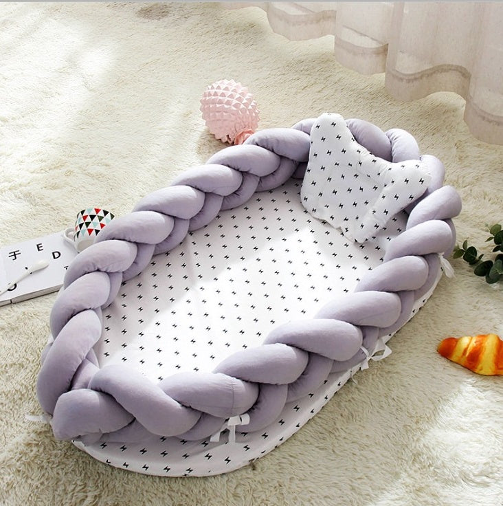 Portable cotton crib by HOMCOM featuring soft cotton fabric, lightweight design, and secure structure for easy mobility.