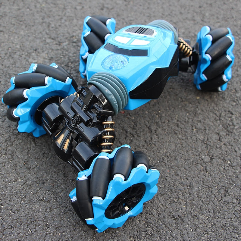 Eprolo 4WD RC stunt car with lights, music, and gesture control, designed for off-road drifting, high-speed climbing, and twisting tricks.