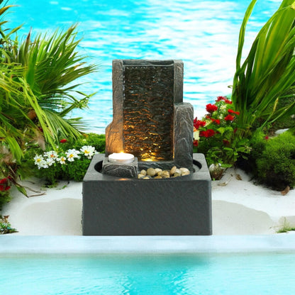 MSL 24cm fountain with flowing water feature, decorative stone base, and intricate design.