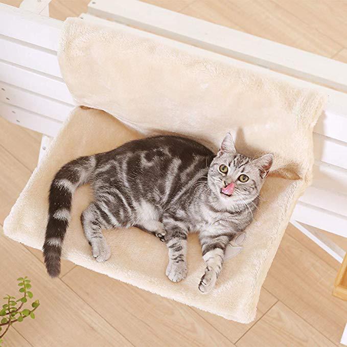 HOMCOM cat bed and hammock with soft fabric and cozy design for comfortable feline relaxation.