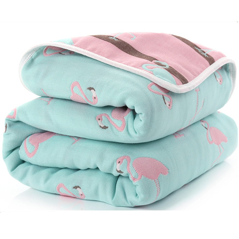 Soft baby muslin cotton blanket with 6 layers, ideal for swaddling, displayed with gentle folds and breathable fabric.