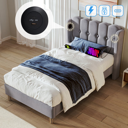 Grey linen upholstered single bed with wooden slatted frame, USB and Type-C charging ports, ideal for teenagers and guest rooms.