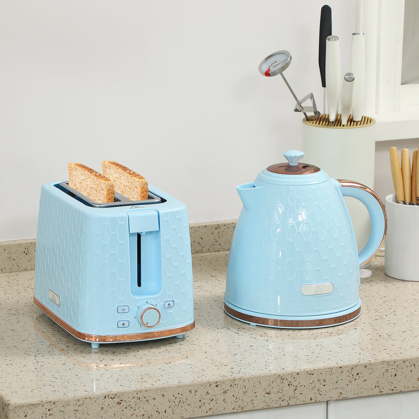 Light blue HOMCOM 1.7L 3000W fast boil kettle and 2-slice toaster set with auto shut-off and browning control buttons.