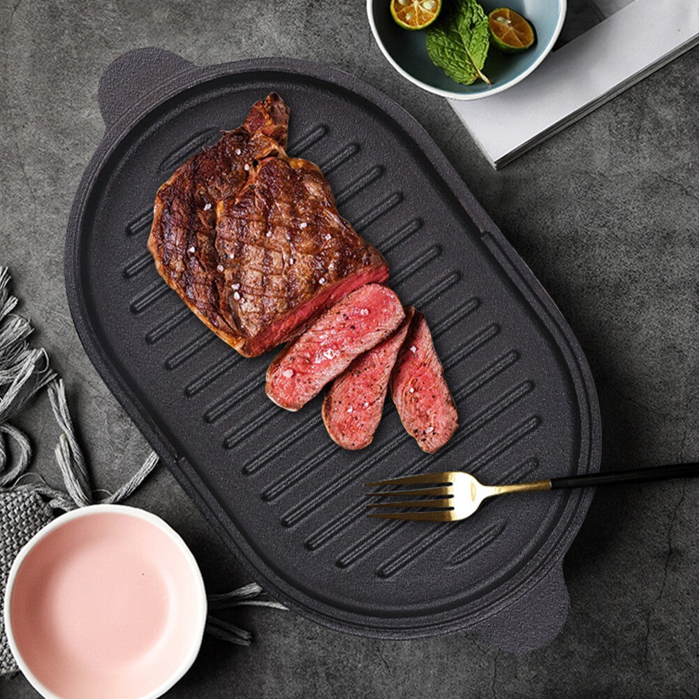 HOMCOM 2-in-1 cast iron Dutch oven and skillet with lid, ideal for camping and versatile cooking in a durable black finish.