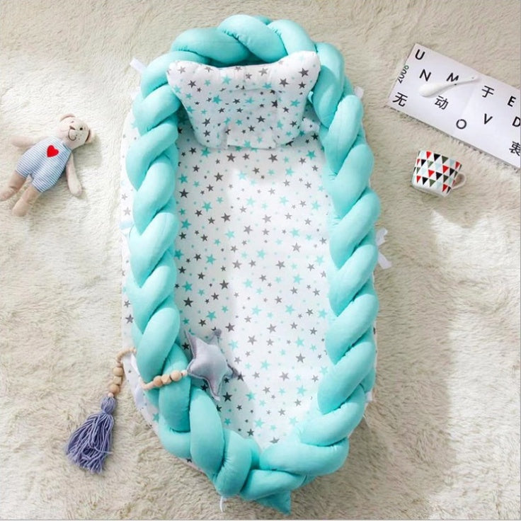 Portable cotton crib by HOMCOM with soft white cotton fabric, sturdy frame, and compact design for easy mobility and safe sleep.