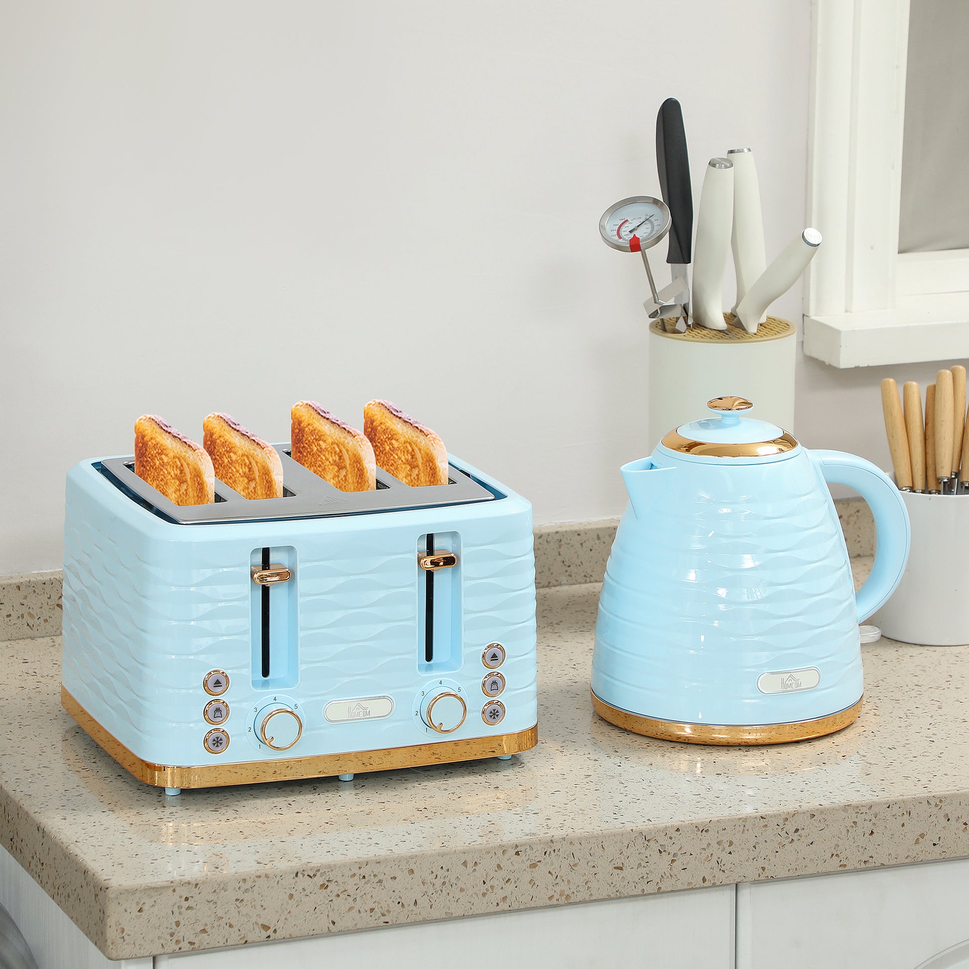 HOMCOM light blue 3000W 1.7L kettle and 4-slice toaster set with 7 browning controls and crumb tray, shown on kitchen countertop.