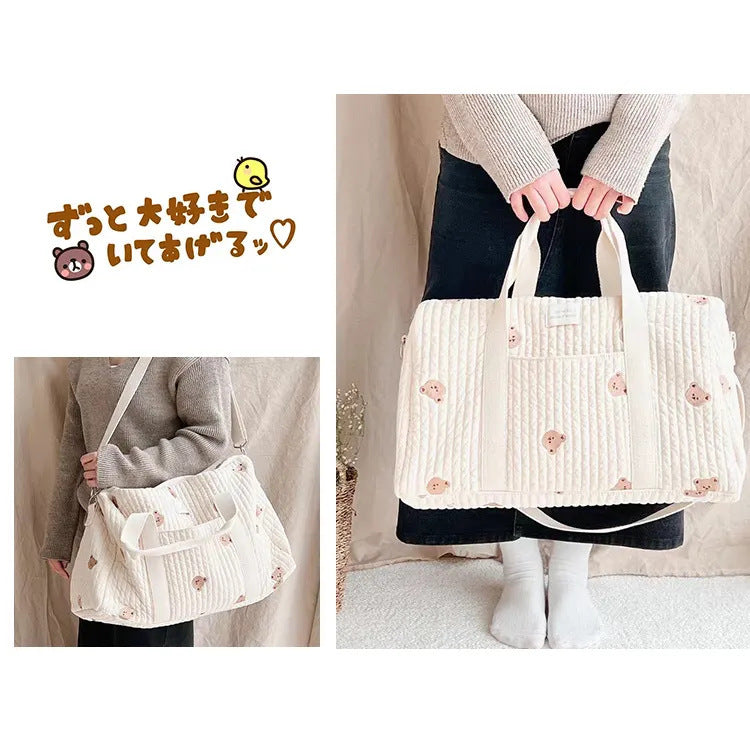 Large embroidered travel bag by eprolo featuring spacious capacity, sturdy handles, and stylish design for travel and everyday use.