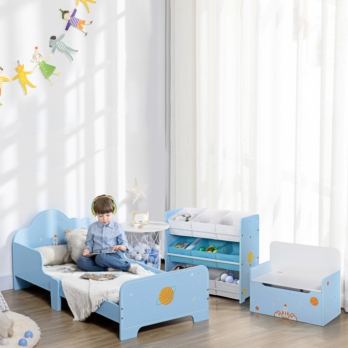 ZoneKiz toddler bed with space-themed patterns, suitable for boys and girls aged 3-6 years, featuring colorful celestial designs.
